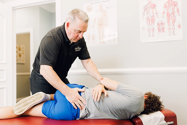 Chiropractor St. Charles IL Pat Calcagno Hip Adjustment